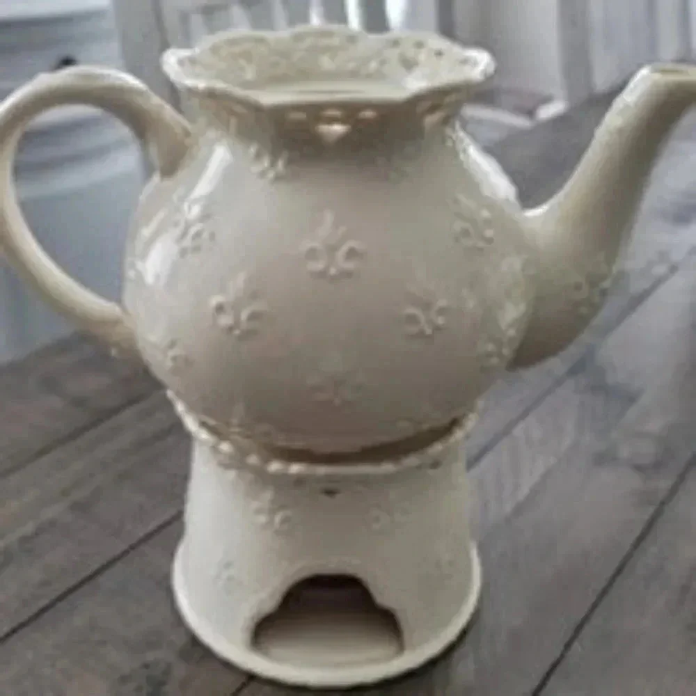 Skye McGhie Cream lace porcelain teapot and tea light warmer stand